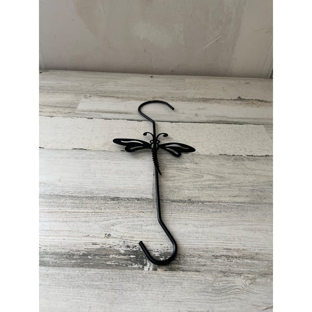 Black metal plant hangar with butterfly design